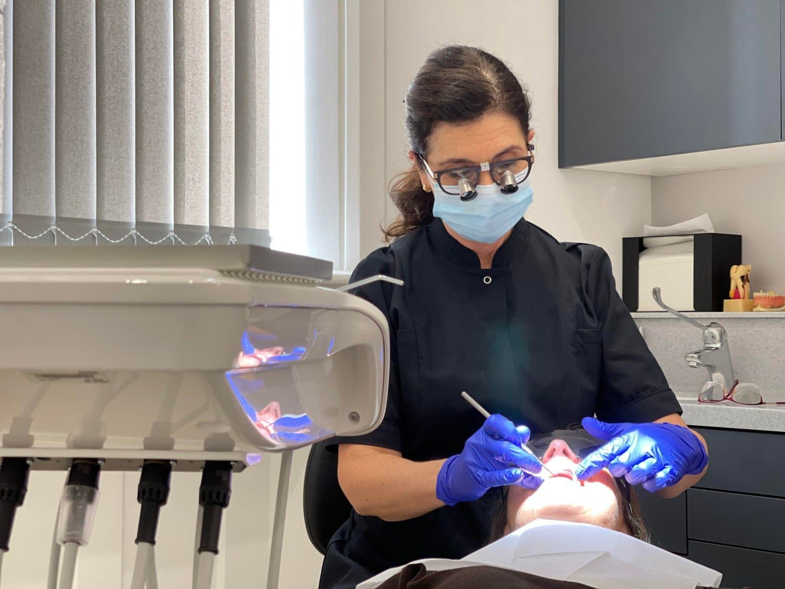 Dr Ana Bosco treating a patient in her London clinic